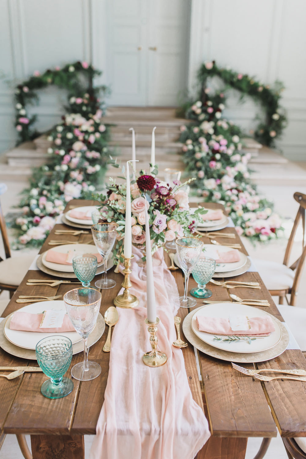 Elegant wedding inspiration in English country mansion Shaw House. Jewel toned tablescape, wedding tablescape, gold and colourful wedding table styling, jewel tone bridal bouquet, sage green and pink colour scheme, calligraphy place names, wedding table stationery