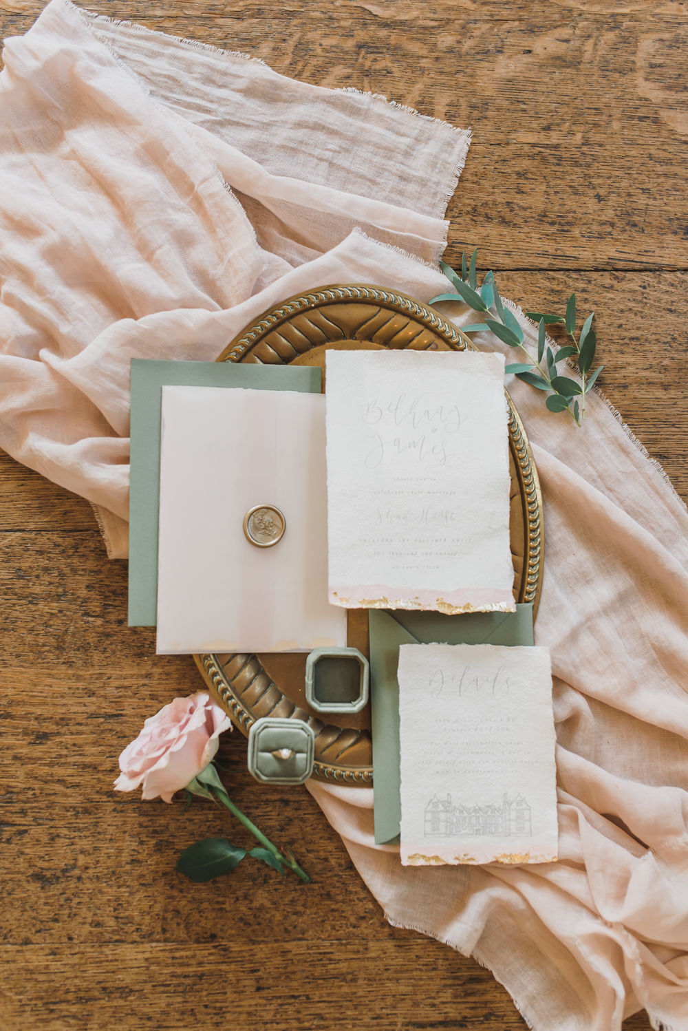 Elegant wedding inspiration in English country mansion Shaw House. Elegant wedding stationery, heirloom wedding stationery, wedding tablescape, sage green and pink colour scheme, calligraphy place names, wedding table stationery