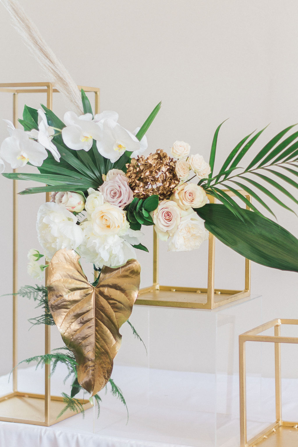 Luxury tablescape, orchid floral display, modern vintage wedding shoot style, gold plinth wedding flowers, modern art deco tablescape, wedding flower inspiration, editorial, styled shoot inspiration
