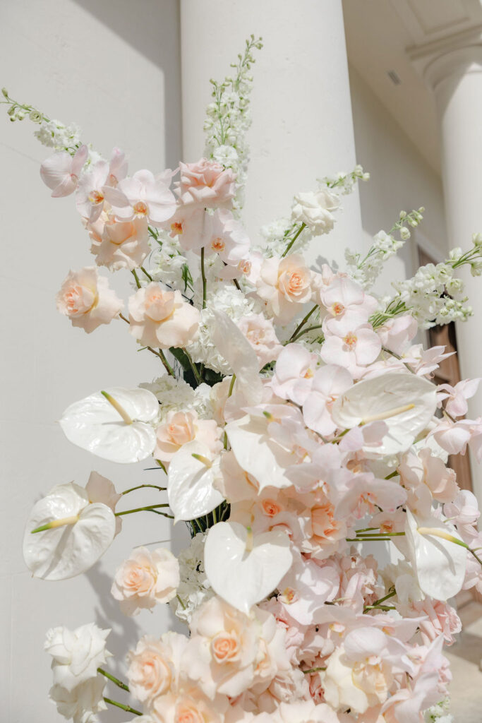 Light editorial bridal shoot for florist with pastel floral details